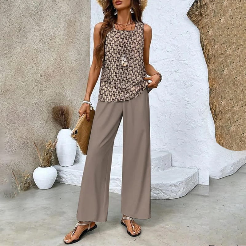🌿 50 % RABATT FÜR BEGRENZTE ZEIT! 🩱 Damen 2-Teiler Sommer-Set – Ärmelloses Top mit asymmetrischem Saum + bedruckte Weitbeinhose, luftig für Urlaub & Alltag 💙