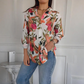 Elegante Bluse mit Pflanzenmuster und Knopfleiste