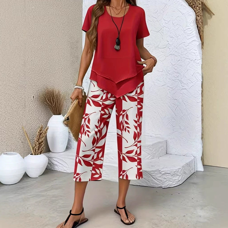 👗🔥 Damen Zweiteiler Set mit asymmetrischem Saum – Einfarbig Kurzarm-Oberteil + bedruckte Weitbeinhose in Größen S-5XL, 4 Farben