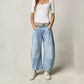 Damen Retro-Jeans mit mittlerem Bund und geschwungenen Weitbeinen